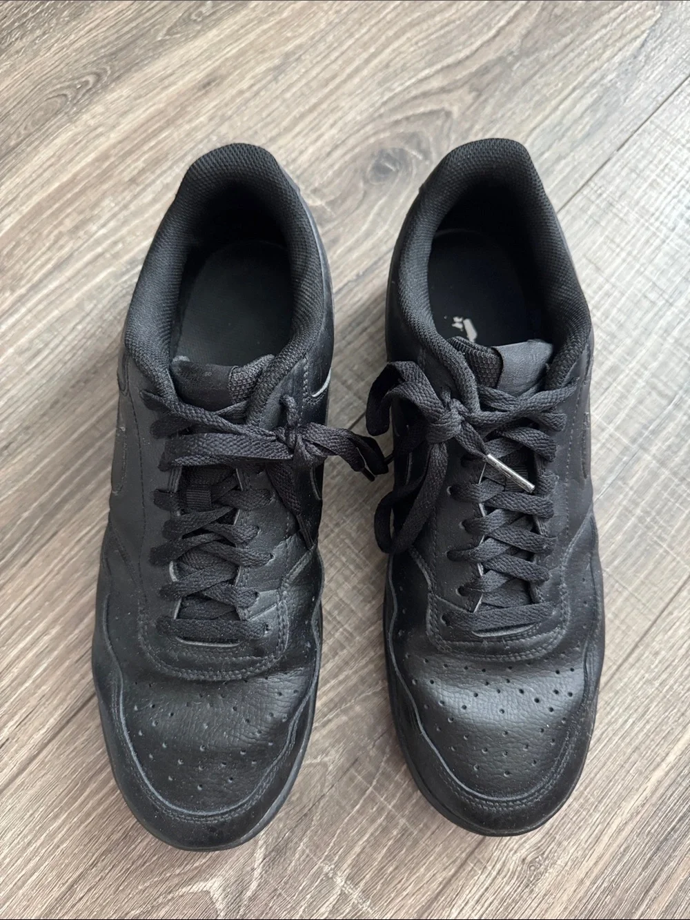 Nike Men’s All-Black Low-Top Leather Sneakers